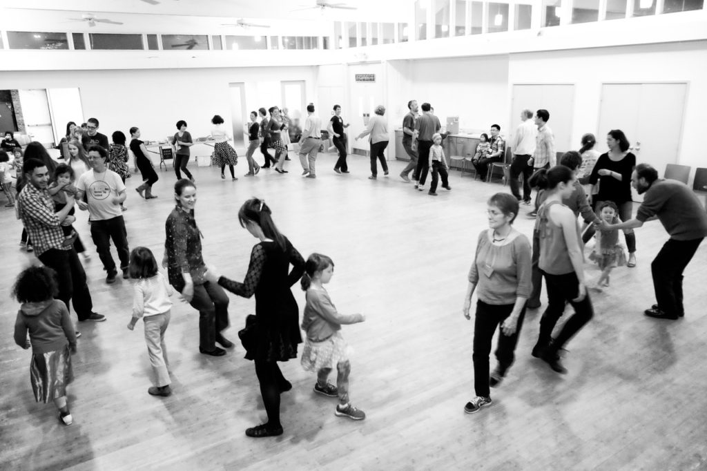 black and white photo at a country dance showing a wide view