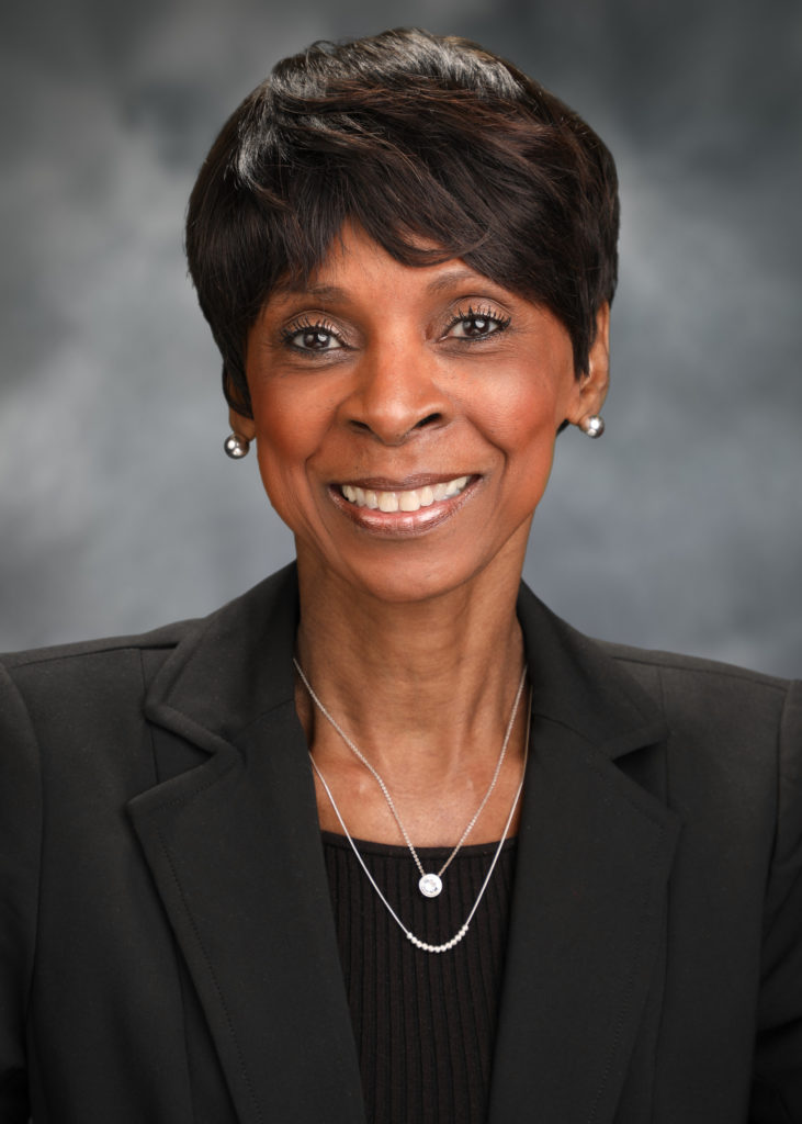 portrait of a woman with a studio background