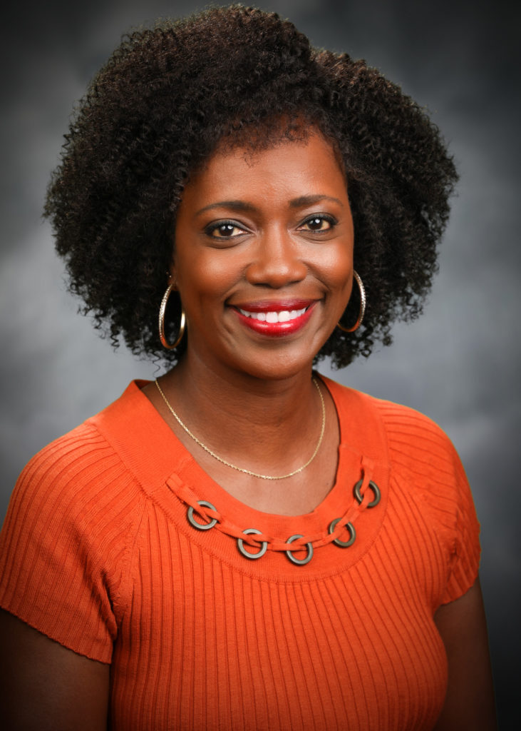 portrait of a woman with a studio background