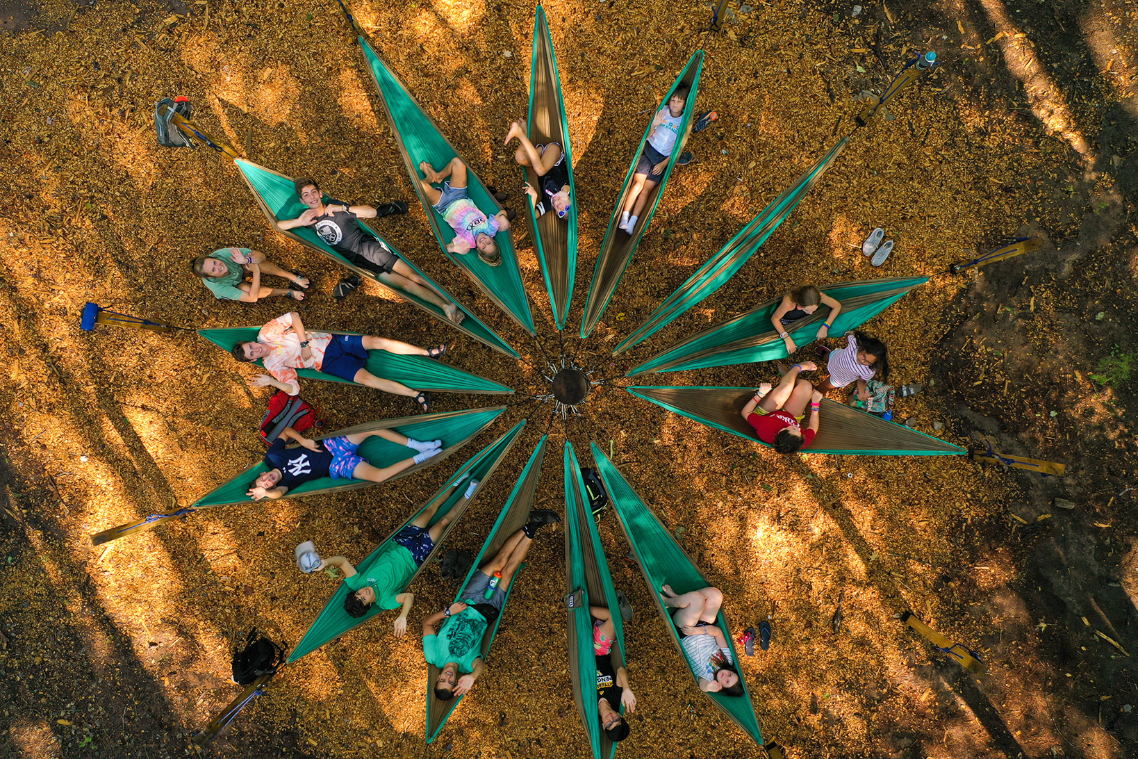 image of kids in a circle of hammocks at a YMCA camp