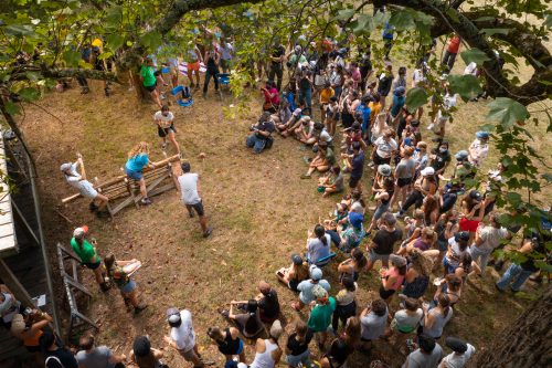 aerial view of students watching a log cutting contest