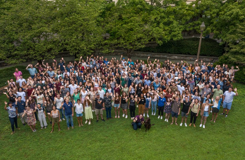 group photo from above of 200 Duke students waiving